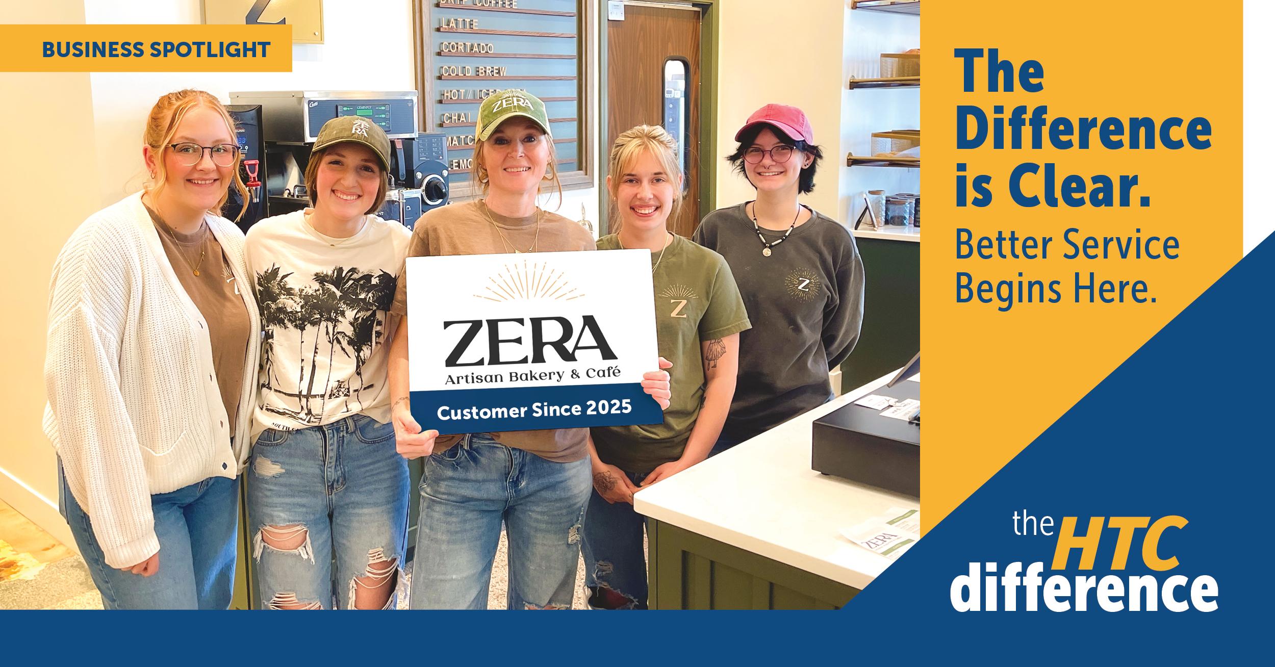 HTC_Blog Graphics_Zera The team at Zera Artisan Bakery poses in their new business with a sign that reads Zera Artisan Bakery - Customers Since 2025.