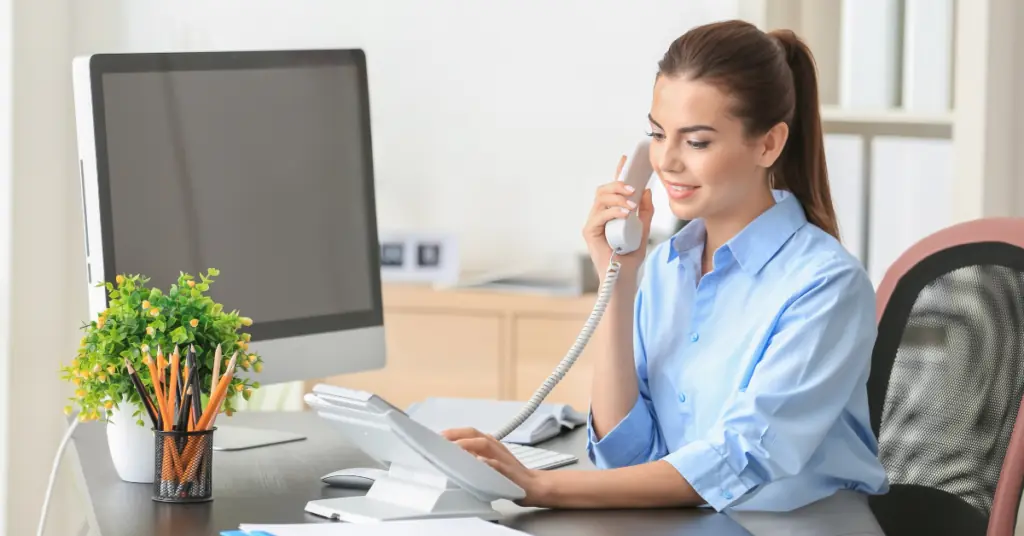 A member of a customer support team filled with real people answering a call with a real solution